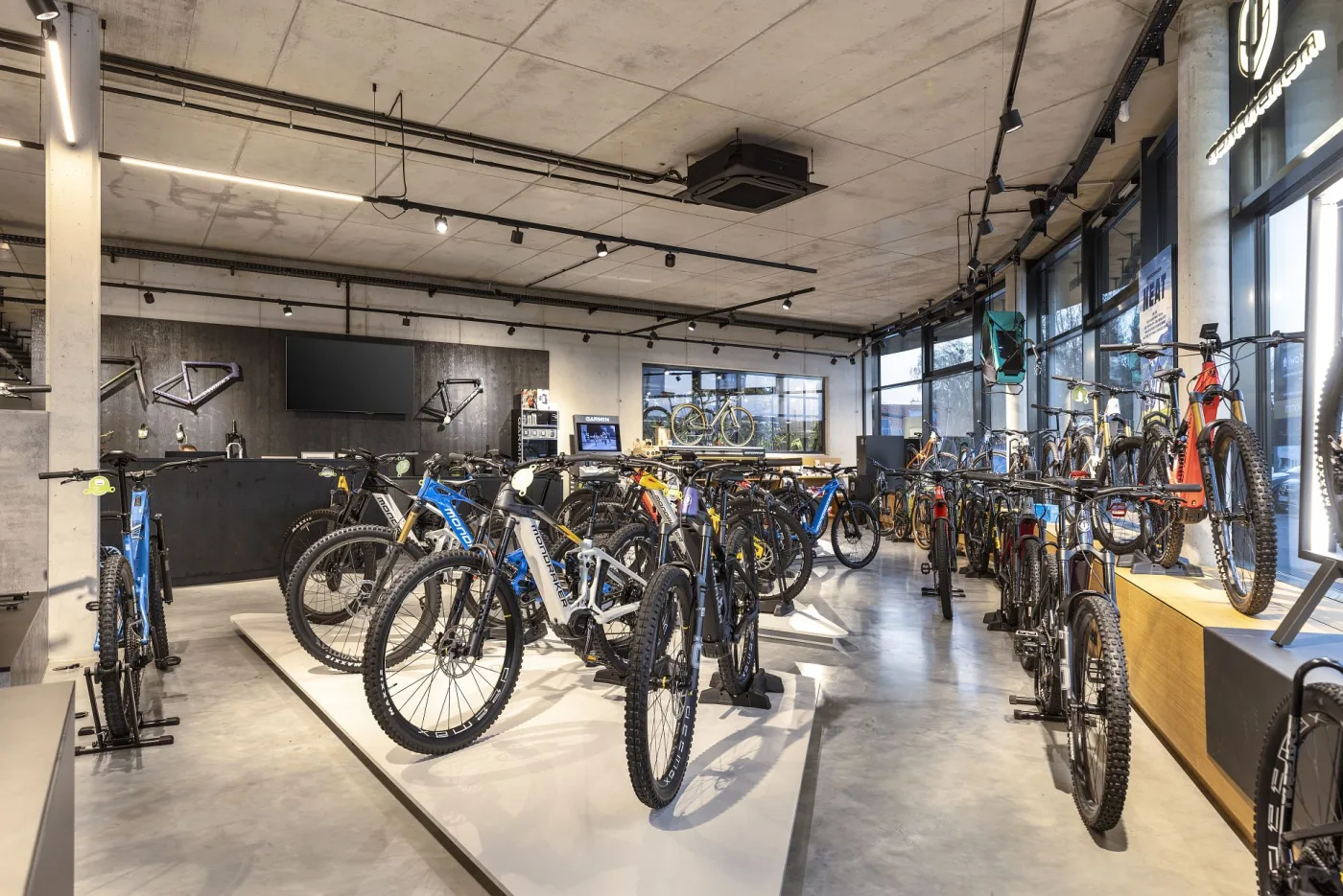 E-mountain bikes on display across the showroom
