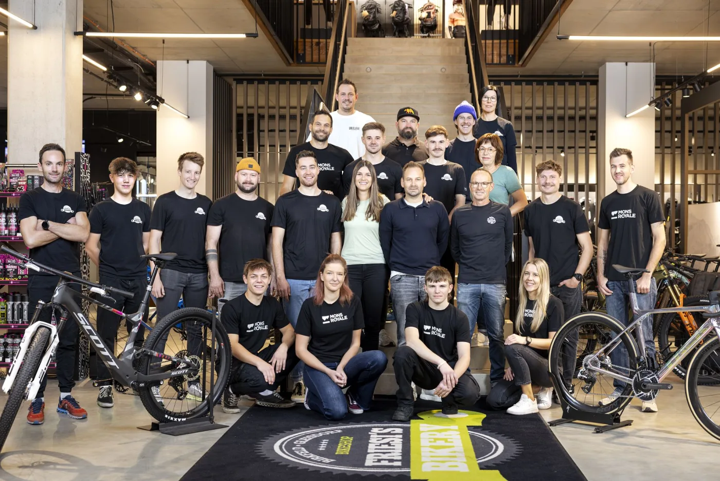 The whole bike-shop team gathered for a group photo